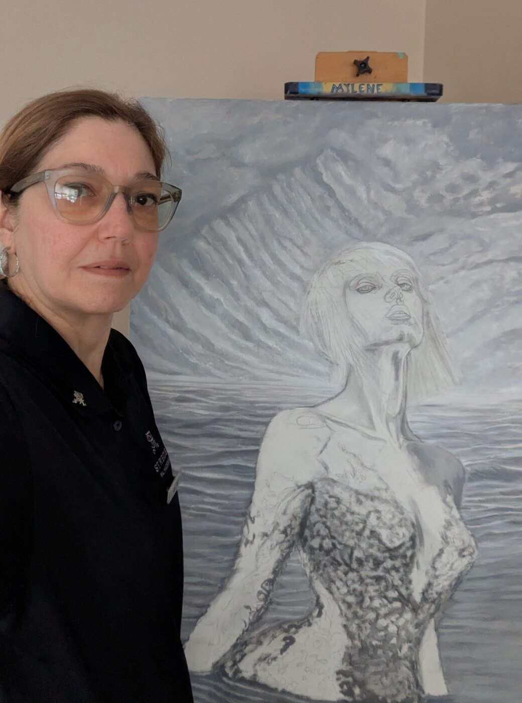 Mylene beside the early drawing stage